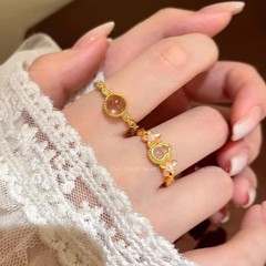 新中国式の軽い豪華な金色のヒョウタンの指輪のレトロなファッションの高級感の指環の個性の風の小さい大衆の百合の食事の指の指輪