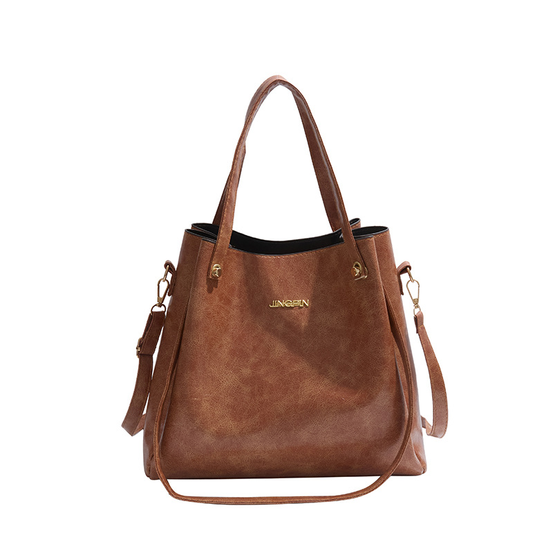 Mochila de moda de cuero suave de gran capacidad 2025, primavera nueva bolsa de hombro de viaje, bolso de mano de cuero retrógrado para mujeres