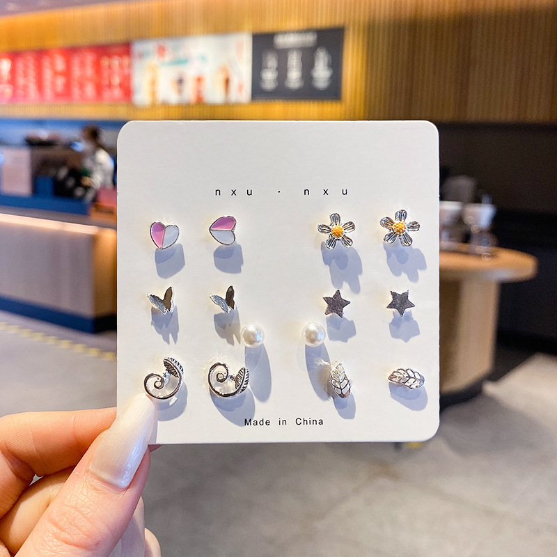 Conjunto de aretes de estilo ins 2024 nuevos aretes de moda pendientes de mujer, estilo de moda, temperamento dulce y versátil, abanico de diosa