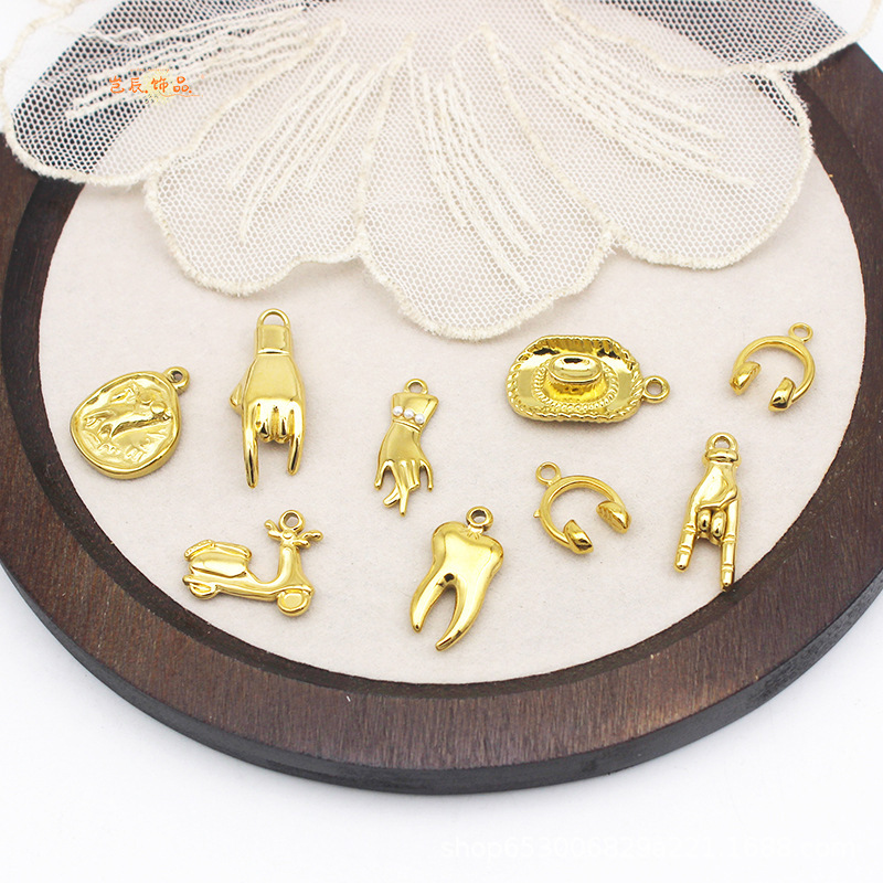 Cross-Border Western Cowboy Hat Palm Earphones Teeth Electric Vehicle Pendant Necklace Vacuum Plated Stainless Steel DIY Accessories Cross-Border Western Cowboy Hat Palm Earphones Teeth Electric Vehicle Pendant Necklace Vacuum Plated Stainless Steel DIY Accessories