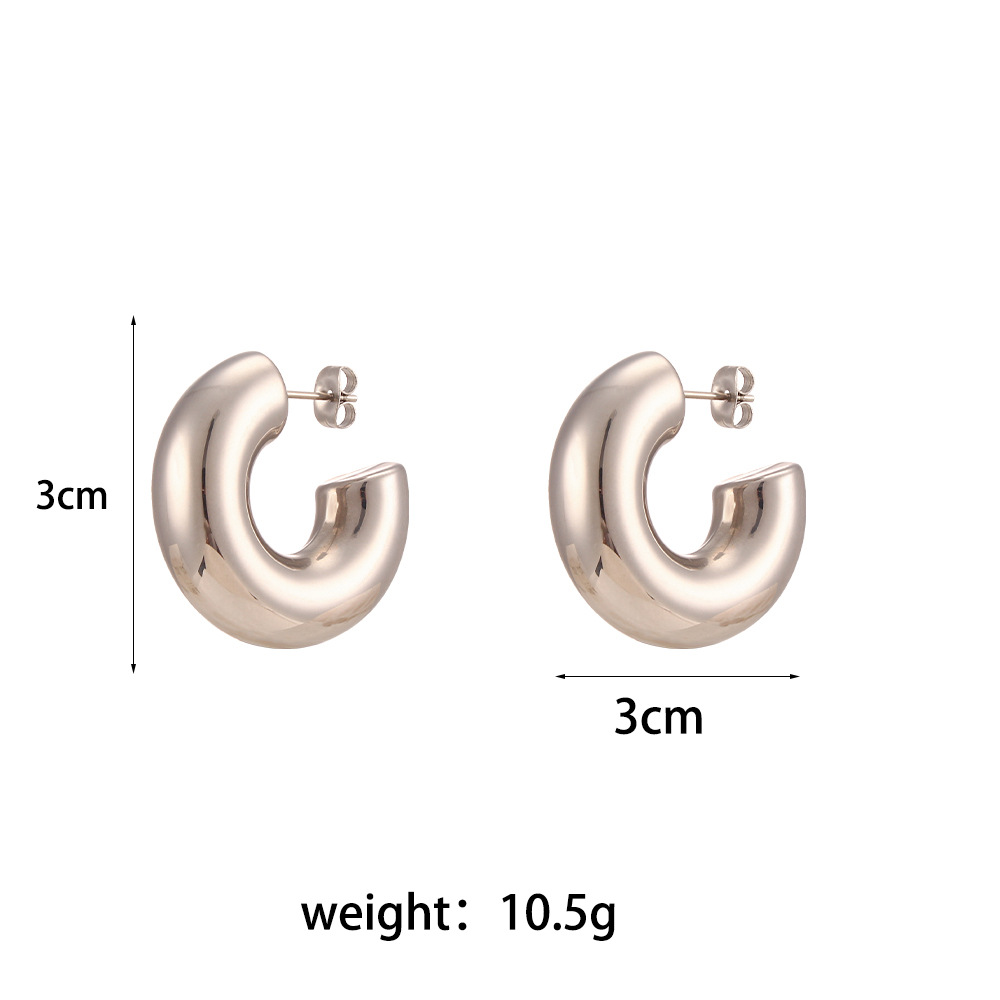 Europeo y americano ins simple titanio acero grueso cilíndrico hueco pendientes mujer de acero inoxidable chapado 18K sólido brillante pendientes de la joyería