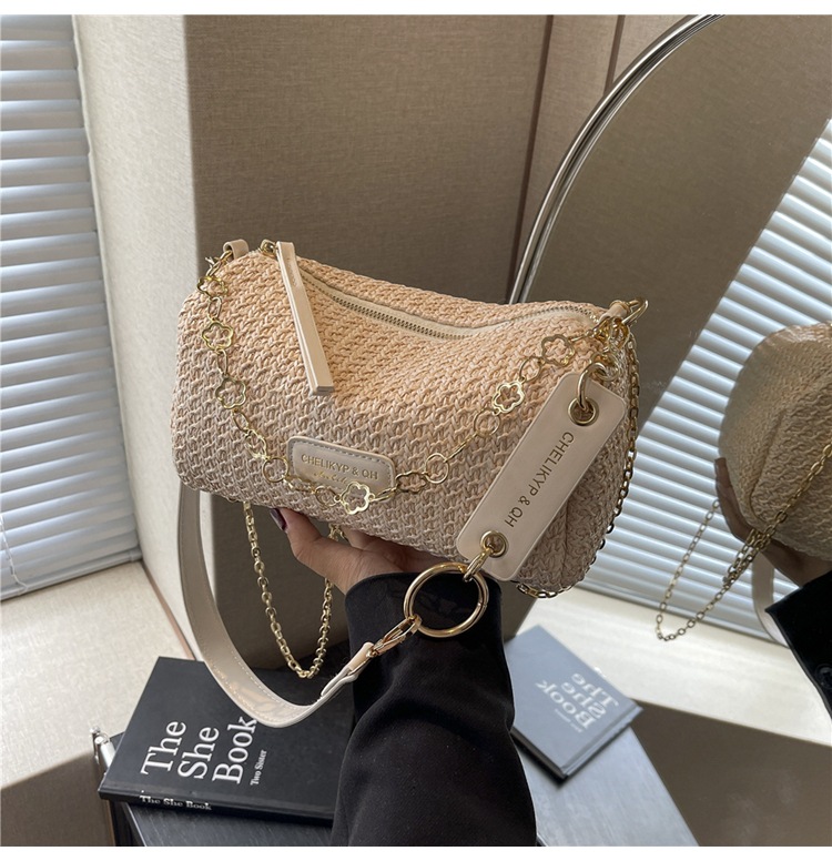Nicho de diseño sensación de bolso de paja para mujeres verano 2024 nuevo popular bolso de cadena de hombro bolso de brazo