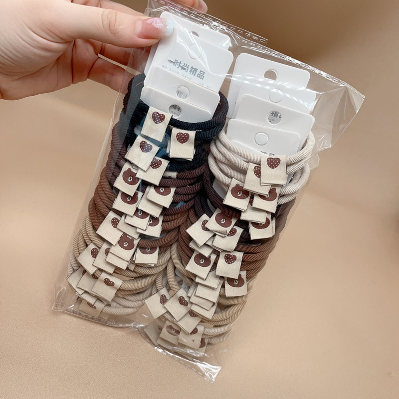 한국 스타일 고무 밴드 가죽 커버 두꺼운 기본 머리띠 여성 포니테일 헤어 로프 헤어 타이 슈퍼마켓 2 위안 도매