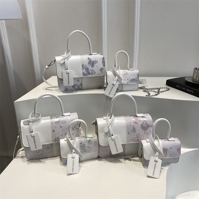 2026 nuevo paquete de hombro extranjero empalmado paquete de hombro de moda simple bolso de mano casual bolso pequeño transfronterizo