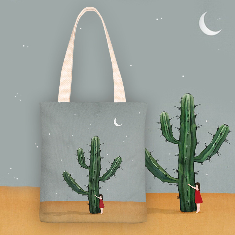 2021新款可爱卡通抱仙人球的女孩学生单肩帆布袋手提袋大容量包包