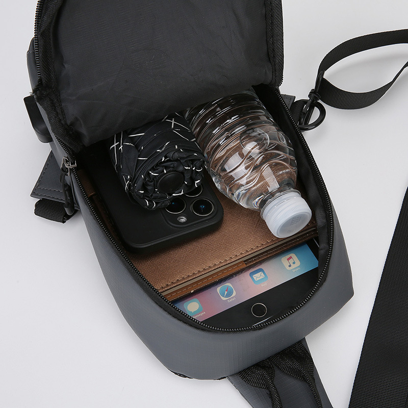 Otoño y invierno nuevo tipo de bolso de pecho de hombre multifuncional cargable USB bolso portátil de hombro para viajar bolso de mano versátil