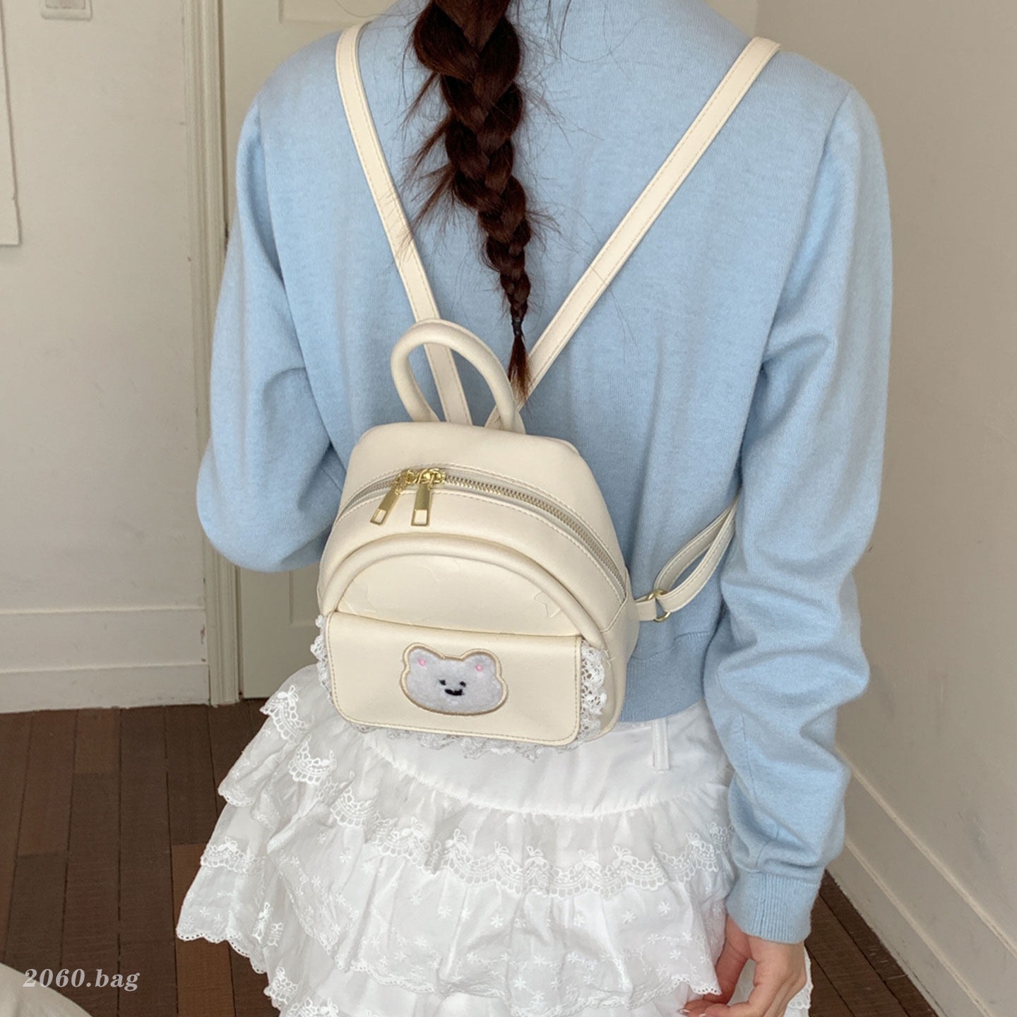 Mujeres nuevas estilos de dibujos animados simples estudiantes 2026 verano universal mochila ligera oso mochila encantador viaje coreano