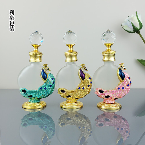 Dubai Perfume Refill Bottles Middle Eastern Essential Oil Glass Bottles Fashionable Darjeeling Tea Alloy Peacock Perfume Empty Bottle Wholesale