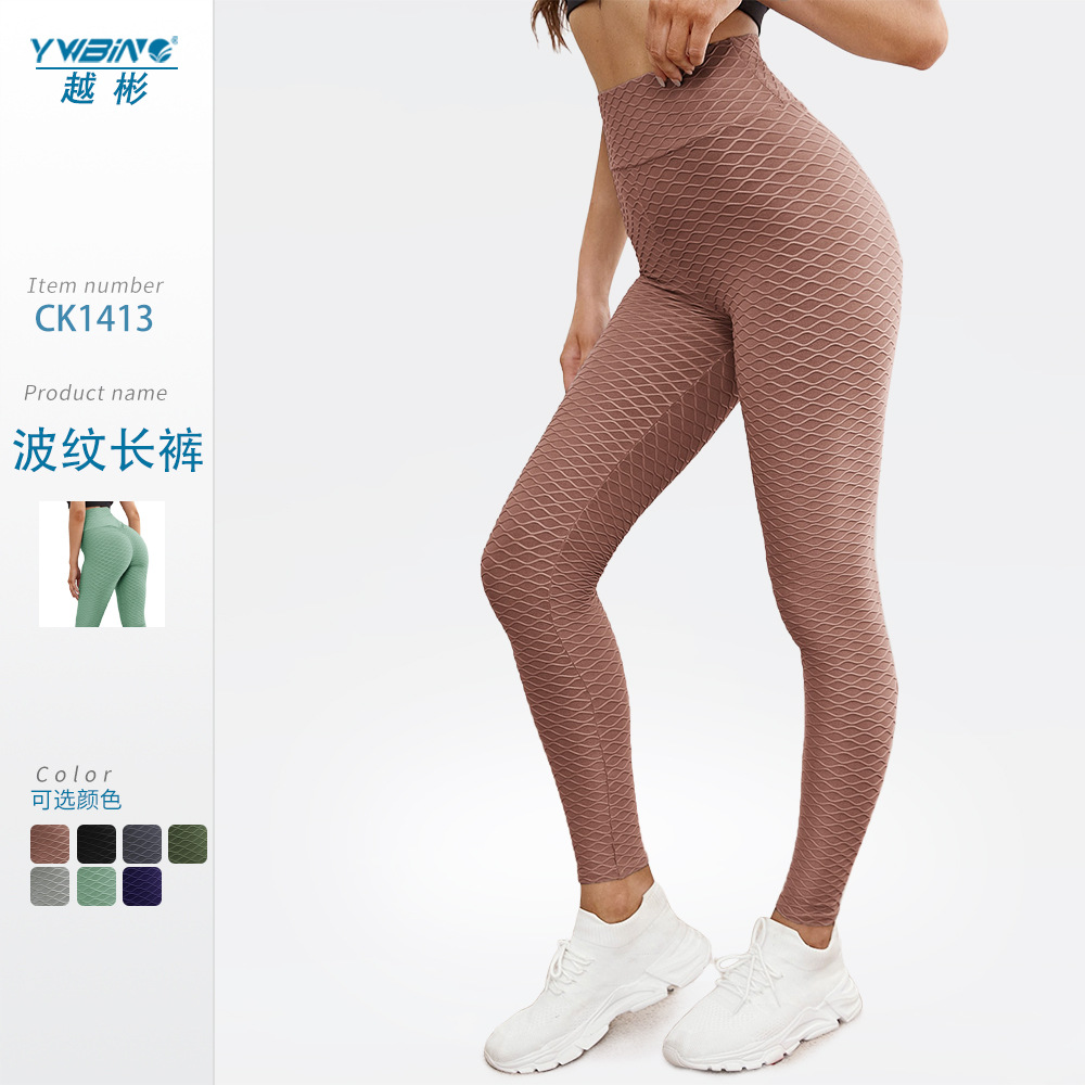 ¡En stock! Europa y América popular melocotón hip lifting onda patrón jacquard yoga burbuja pantalones de cintura alta medias deportivas para las mujeres