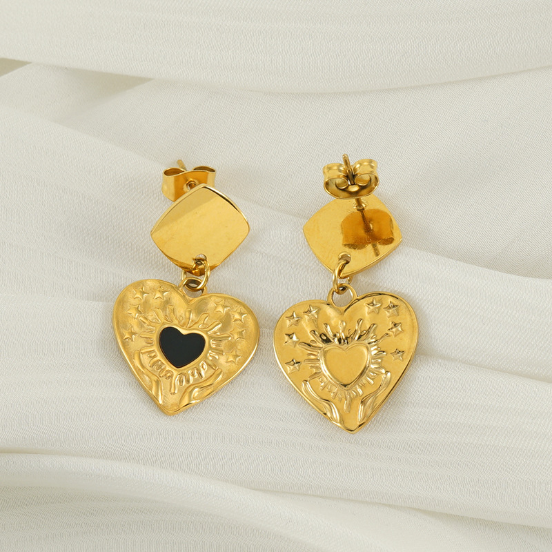 Pendientes de amor de aceite de goteo de lujo ligero de nuevo estilo, personalidad de moda femenina, colgante de corazón de melocotón, pendientes chapados en oro de 18 quilates, fabricante de sensación de alta gama