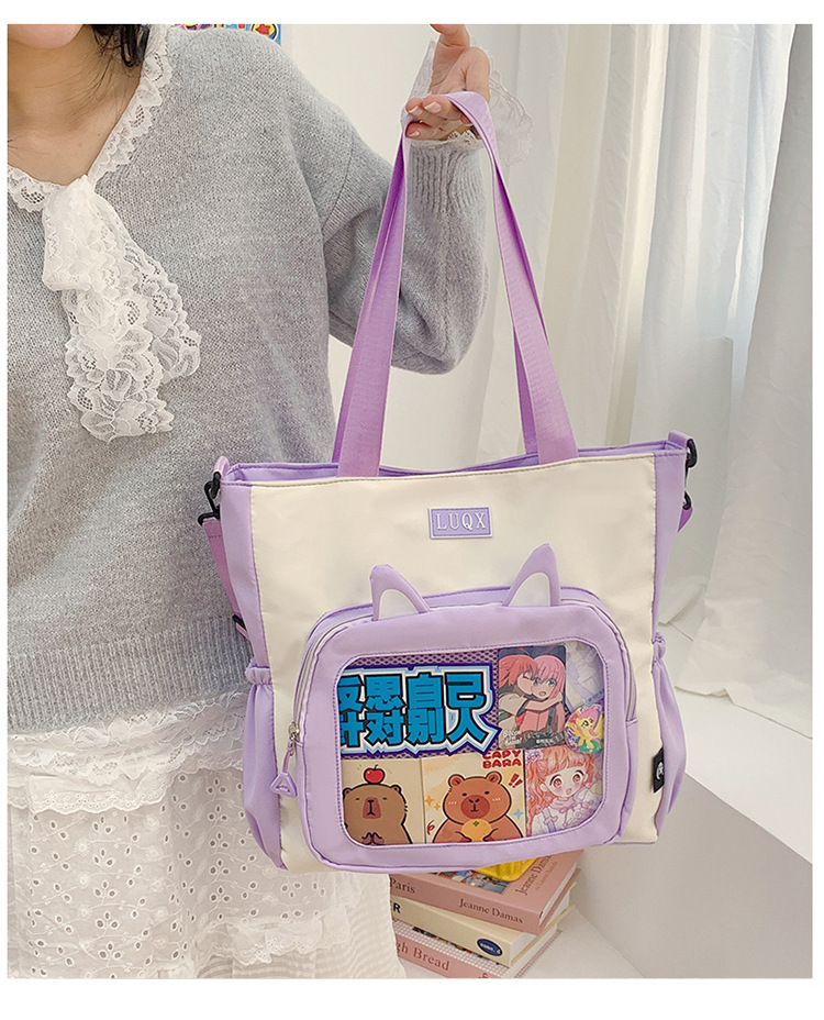 The new cute cartoon printed student bag with a large capacity and transparent student storage single-shoulder bag is selling well for women full figure