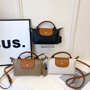 �p���¿�С���^��ţƤ�֙C��Ůб��С�����e��ƤŮ���๦�����X��