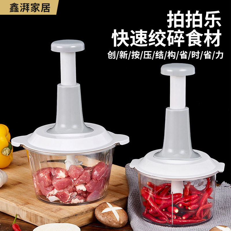 工場の卸売り代行の大量の現物はニンニクの泥の料理器を押して肉を絞る機の家庭用の手動の補助食機をたたきます。|undefined