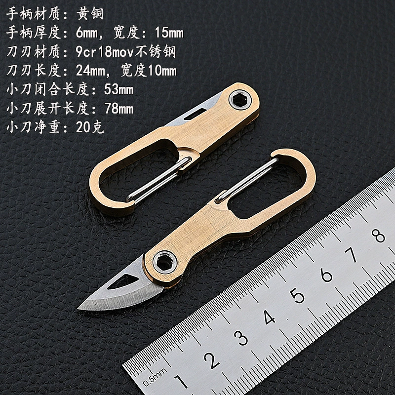 Brass keychain, sharp pocket knife, handheld box