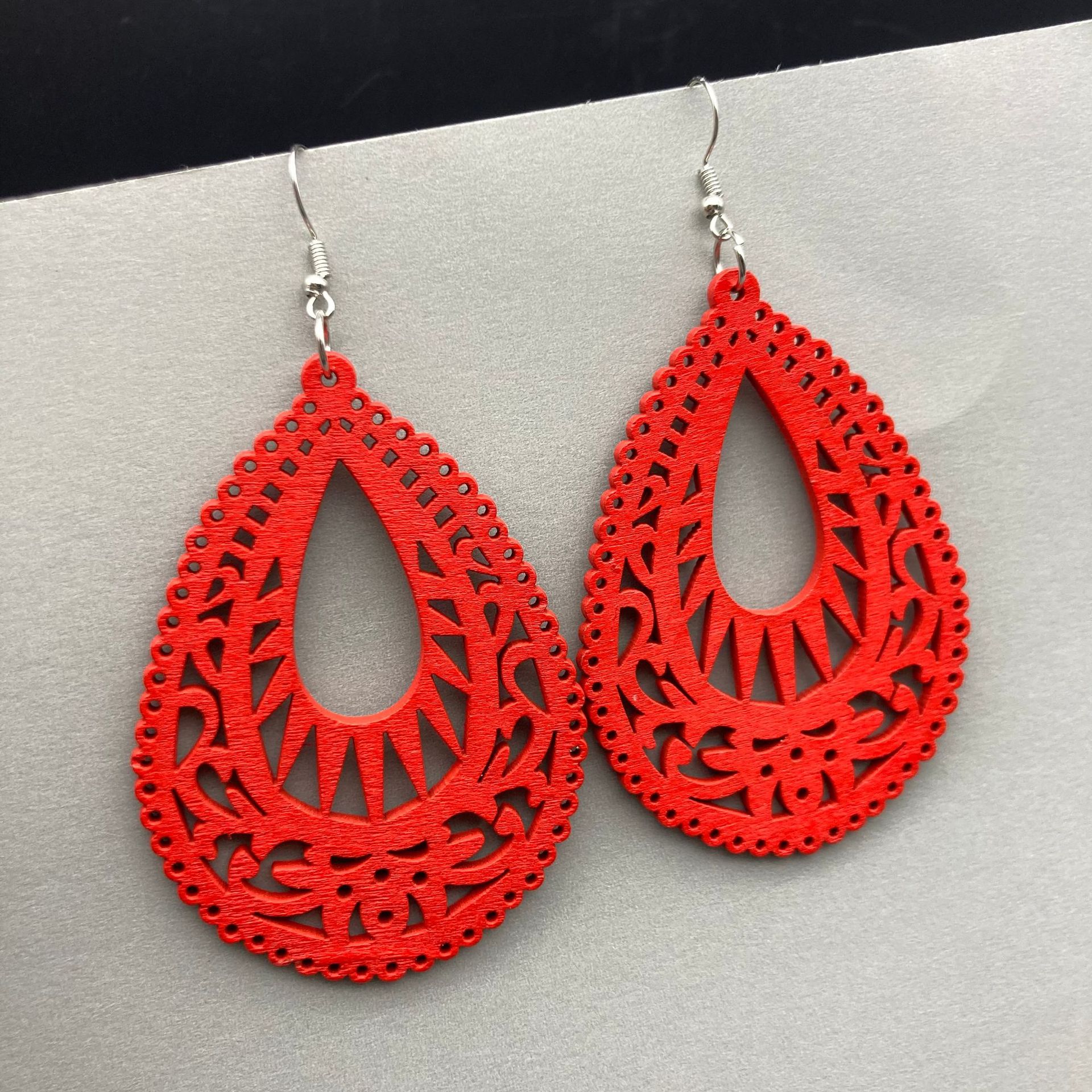 1 Pair Casual Ethnic Style Water Droplets Stoving Varnish Hollow Out Wood Drop Earrings display picture 9