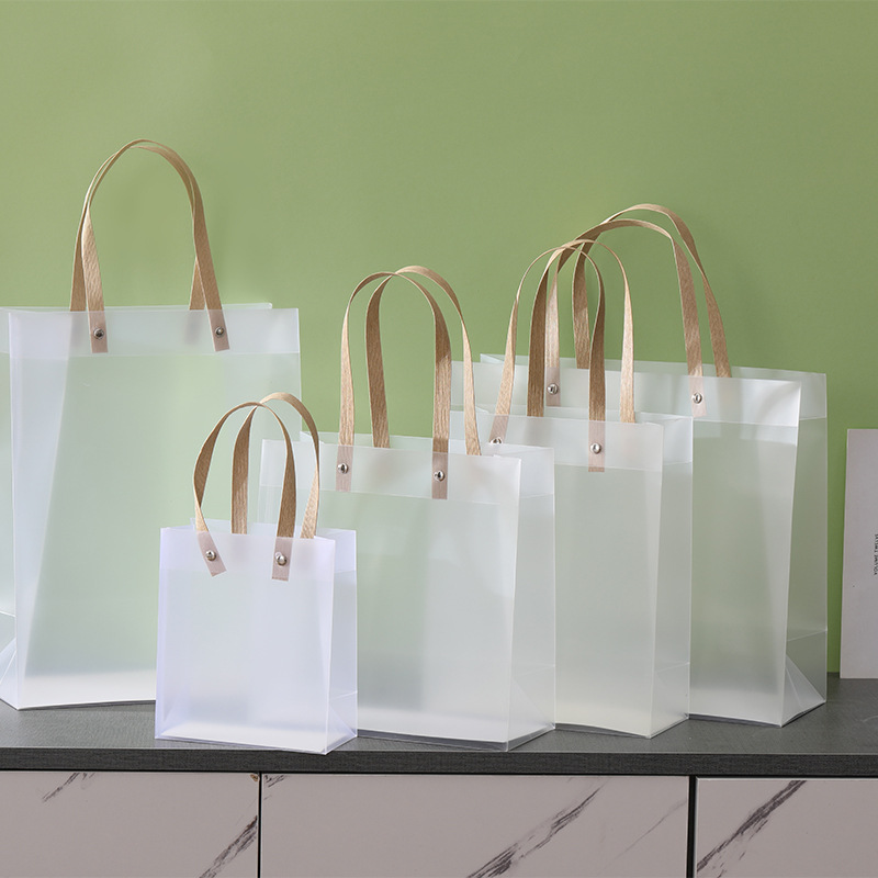 Bolsas de tela transparentes esmeriladas para tiendas de ropa, recuerdos de boda, bolsas de regalo de Navidad con impresión de logotipo, impresión personalizada, disponibles en stock.