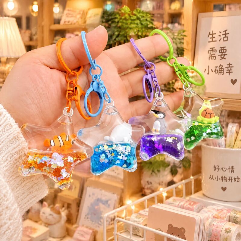 Creative acrylic oil into the ocean fish liquid quicksand bottle keychain five-pointed star floating car key chain pendant Creative acrylic oil into the ocean fish liquid quicksand bottle keychain five-pointed star floating car key chain pendant