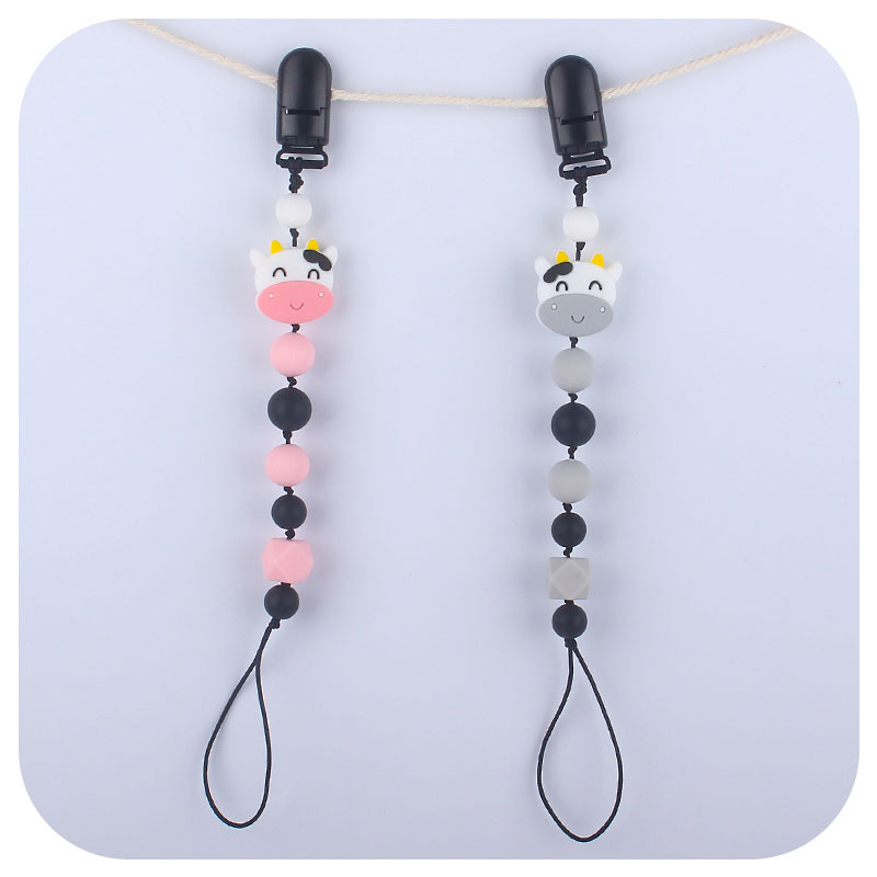 Suministros para bebés de silicona vaca chupete cadena bebé mordedor palo cadena anti-caída Amazon nueva cadena anti-perdida