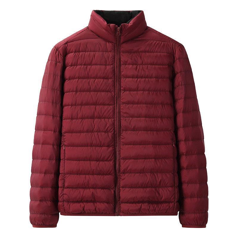 2021 Otoño e Invierno Chaqueta ligera de algodón acolchado con capucha chaqueta casual corta de los hombres coreanos abrigo de talla grande joven y mediana edad