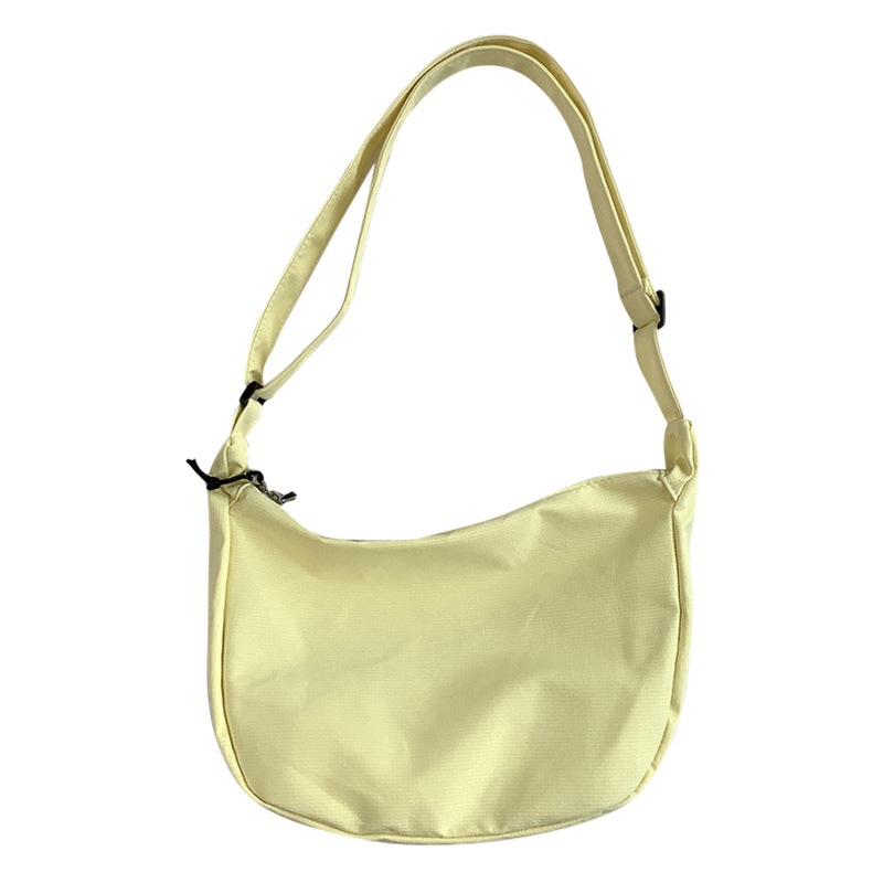 Estilo coreano versátil estudiante ins japonés Harajuku simple waffle artístico hombro color sólido mensajero bolsa dumpling bolsa