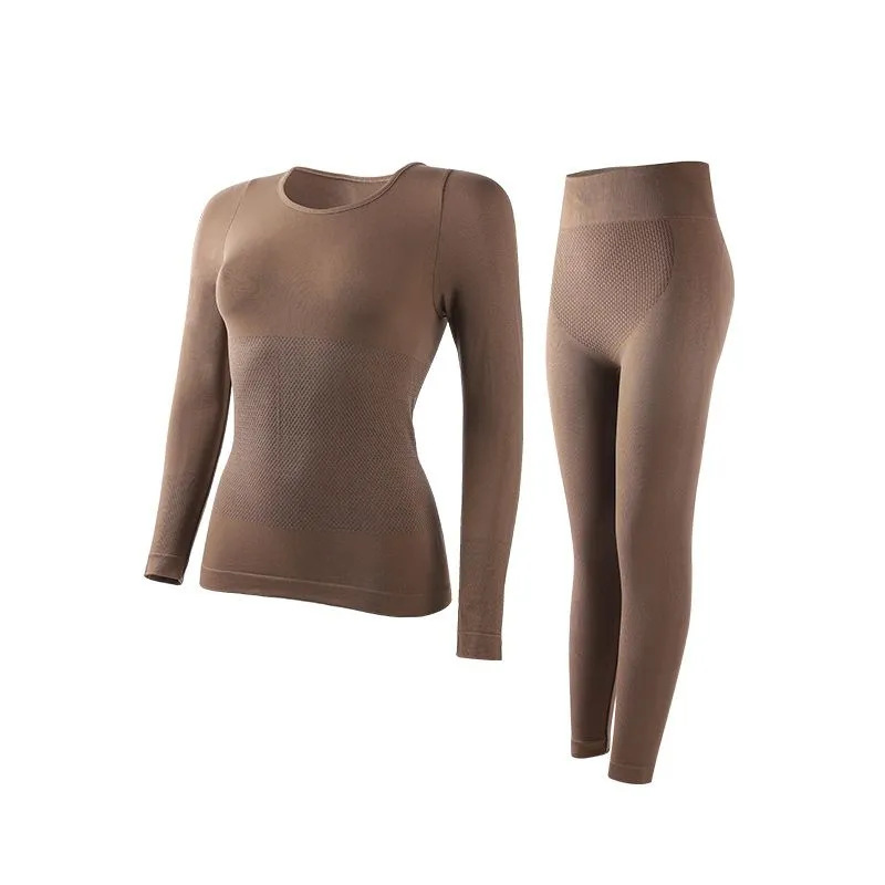 Otoño y invierno sin marcas de lana calentamiento interior damas calentamiento espontáneo de manga larga delgada belleza de la forma de la base delgada set