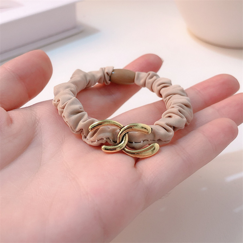 aleación de moda intestino delgado cabello anillo de cabeza cuerda de mujer temperamento simple atar joyas de cabello nuevo estilo de alta sensación simple joyas de cabello cuerda