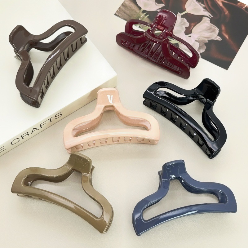 Pearl twist hair clip with plastic embellishment women's Korean side clip Korean style individually packaged pastoral two-yuan store accessories