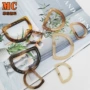 半圆花纹树脂服装纽扣