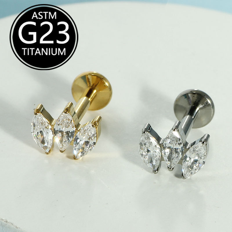 Silver pointed spike labret stud material detail