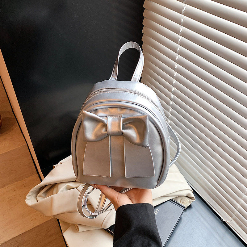Lindo bolso pequeño con lazo simple 2025 verano nuevo estilo diseño sentido mochila pequeña moda estilo occidental mochila salvaje