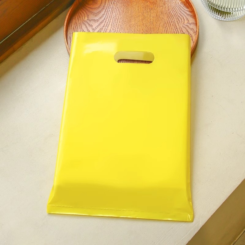 Bolsa de mano de tienda de ropa de grosor, bolsa de embalaje de ropa para niños y niñas, bolsa de almacenamiento de cosméticos, bolsa de regalo, bolsa de embalaje comercial