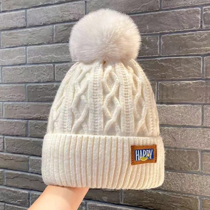Hat women's winter woolen warm woolen hat women's winter tide hairball knitted hat Korean version of the tide all the thick cold hat