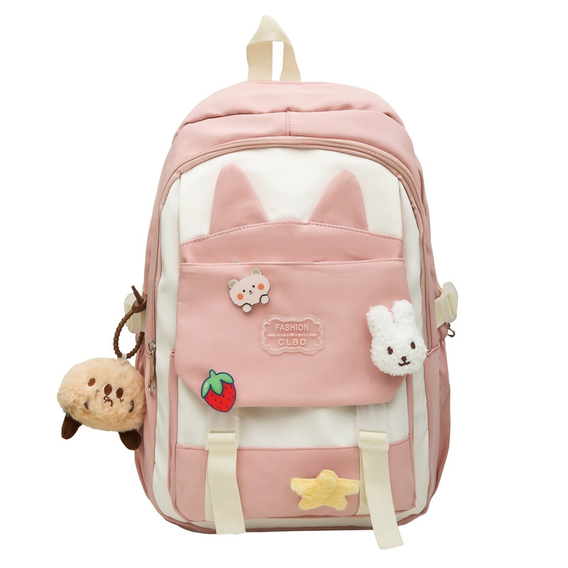 La versión coreana de las mochilas escolares de doble hombro está llena de mochilas escolares de primaria y mochilas escolares de tendencia de la escuela secundaria de gran capacidad.