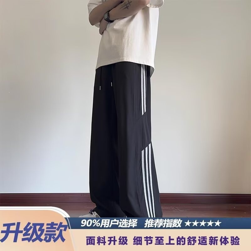 Pantalones casuales a rayas para hombres de primavera y otoño nuevos estudiantes adolescentes sueltos comercio exterior americano tres pantalones para hombres de verano