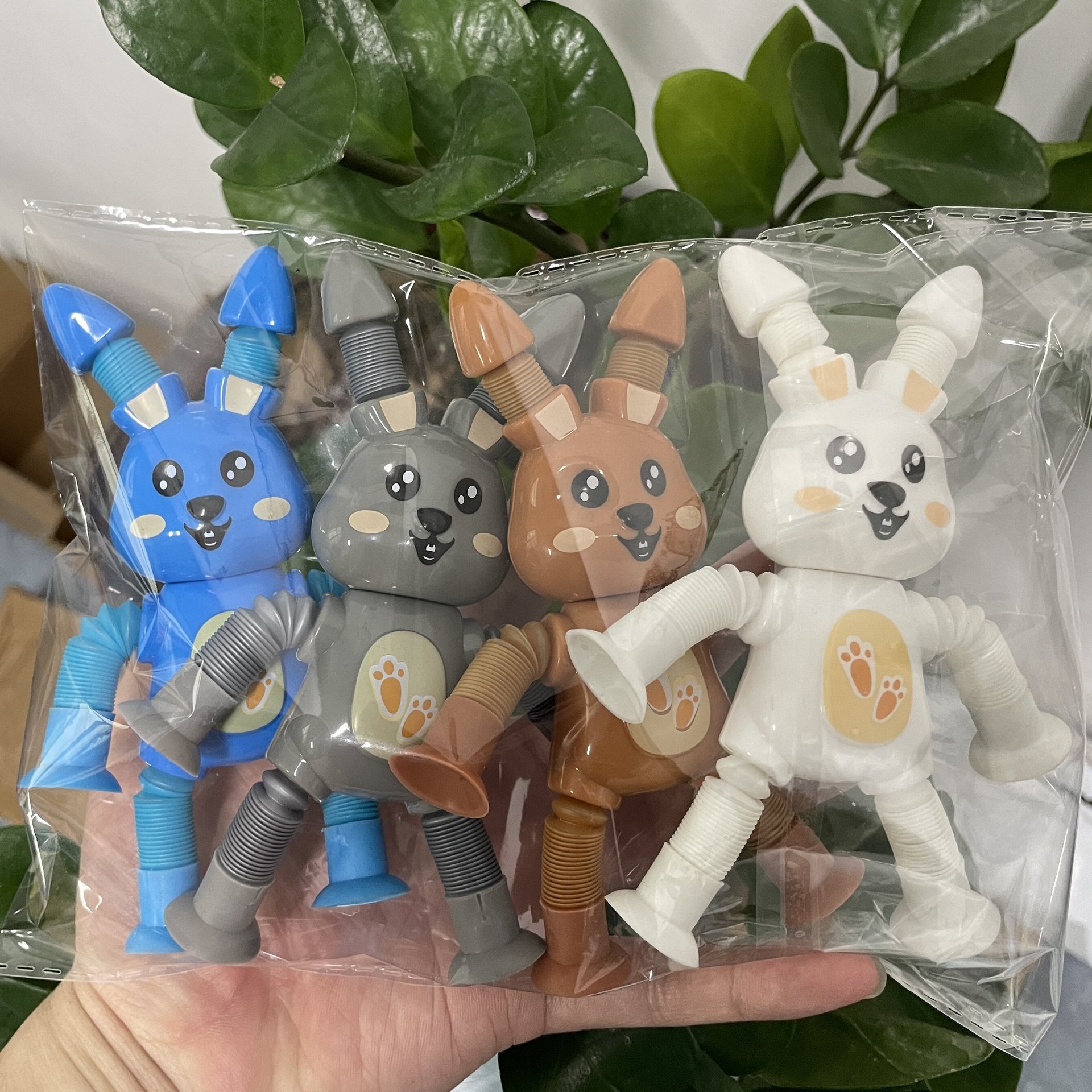 Transfronterizo robot flexible tubo telescópico niño puzzle dibujos animados estirados ventosa interacción padre-hijo creativo juguete descompresión