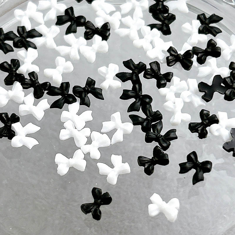 Classic black and white nail jewelry bow simple bow tie resin nail jewelry Japanese three-dimensional ribbon wholesale Classic black and white nail jewelry bow simple bow tie resin nail jewelry Japanese three-dimensional ribbon wholesale