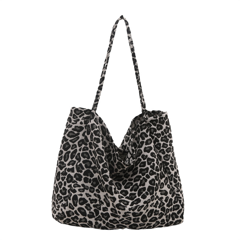 Otoño y invierno bolsas de terciopelo de seda de gran capacidad para mujeres 2024 nueva moda leopardo de hombro bolsas de viaje bolsas de brazo