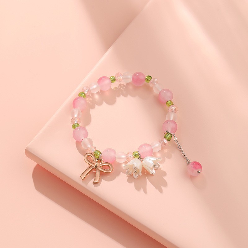 S018-Pulsera flor de lirio de los valles lazo rosa#talla 189