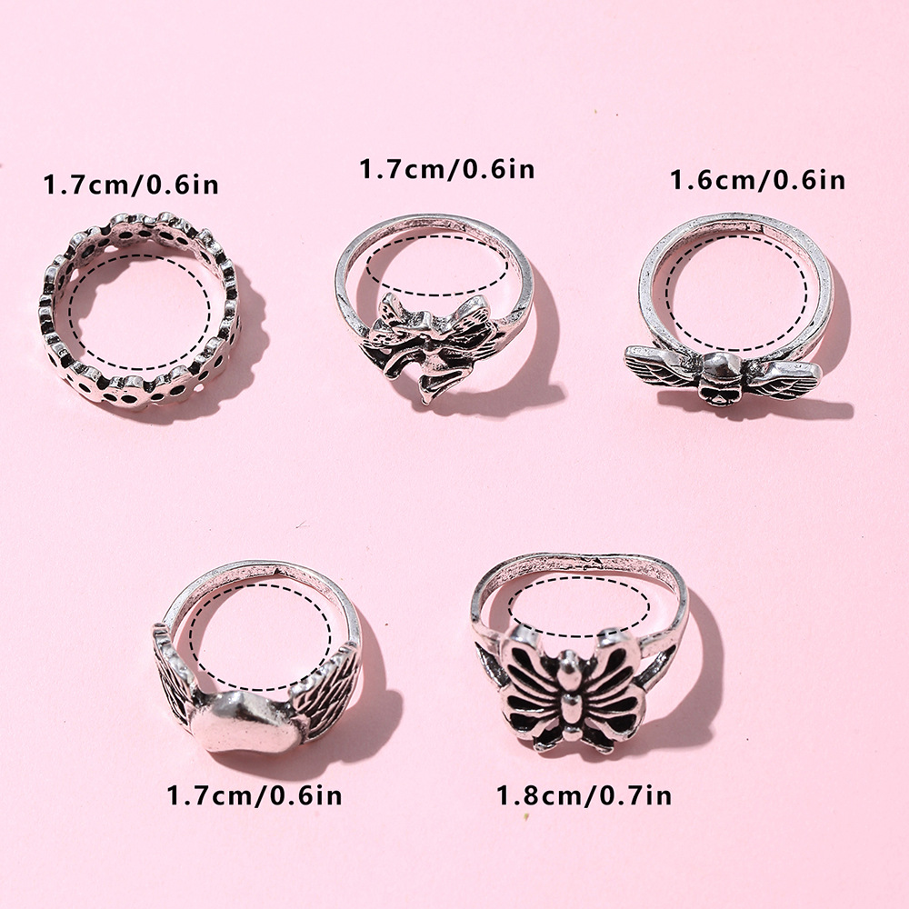 New Retro Creative Peach Heart Hollow Butterfly Alloy Joint Ring Five-piece Set display picture 1