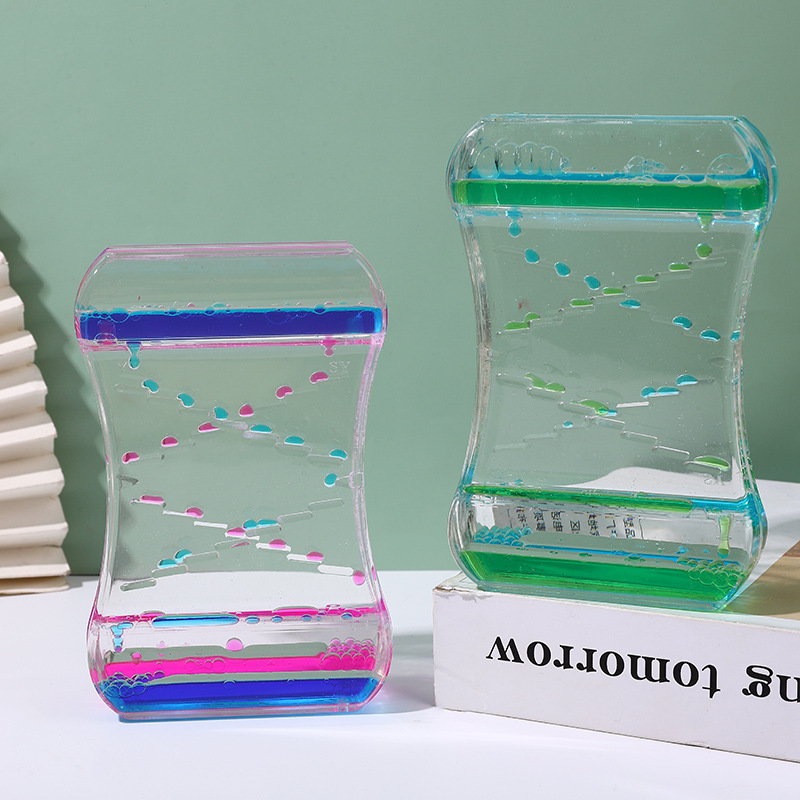 Creative slide oil drip oil spill toy plastic funnel ornaments liquid hourglass dynamic oil spill wholesale student decompression