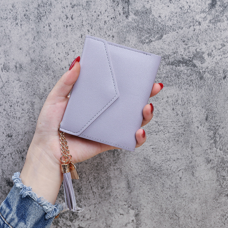 Monedero con borla estilo coreano, cartera corta de tres pliegues para mujer, venta directa de fábrica, popular en plataformas de comercio exterior
