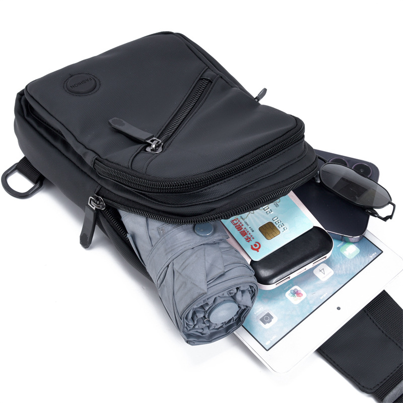 Bolso de pecho para hombres de moda versátil de color sólido simple 2026 nuevo viaje al aire libre de gran capacidad portátil mochila impermeable