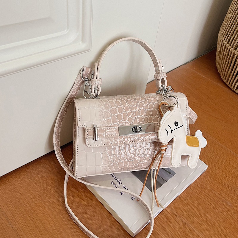 Cross-border 2026 primavera nuevo estilo coreano portátil cocodrilo Kylie bolso cuadrado sensación alta lujo ligero versátil mochila