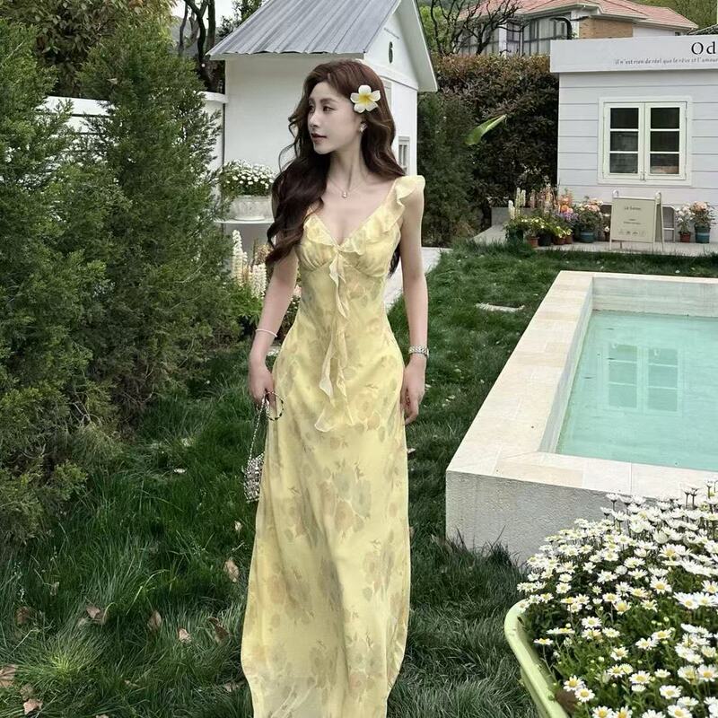 Tea Break French Yellow Floral Suspender Dress Seaside Vacation Unique Beautiful Ruffled Elegant Waist Long Skirt Tea Break French Yellow Floral Suspender Dress Seaside Vacation Unique Beautiful Ruffled Elegant Waist Long Skirt