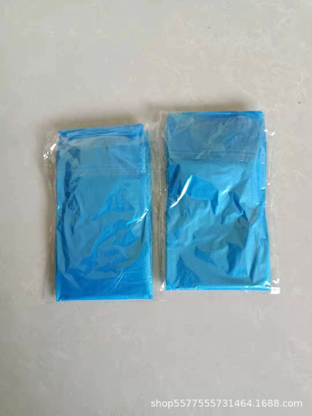 Cubierta de zapato larga desechable PE engrosada a prueba de polvo a prueba de lluvia color transparente banda de goma azul oscuro cordón cubierta de bota a la deriva