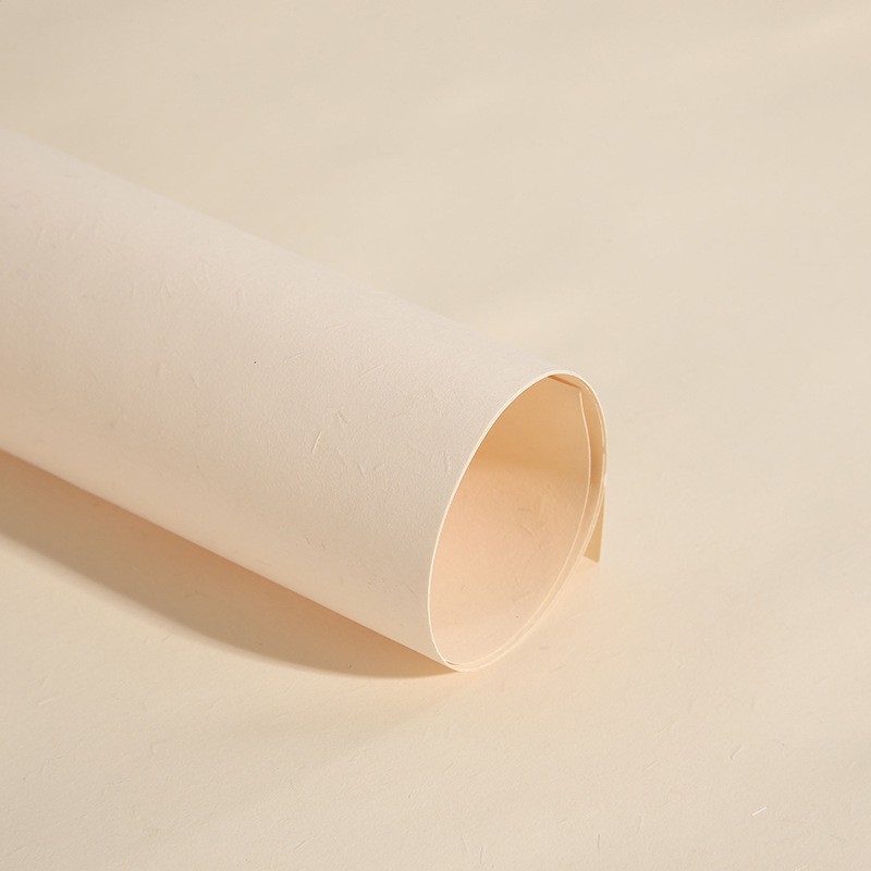 Fabricante mayorista de papel de hierba de color retro papel de fibra de pulpa de madera hermosa caja de regalo embalaje papel especial