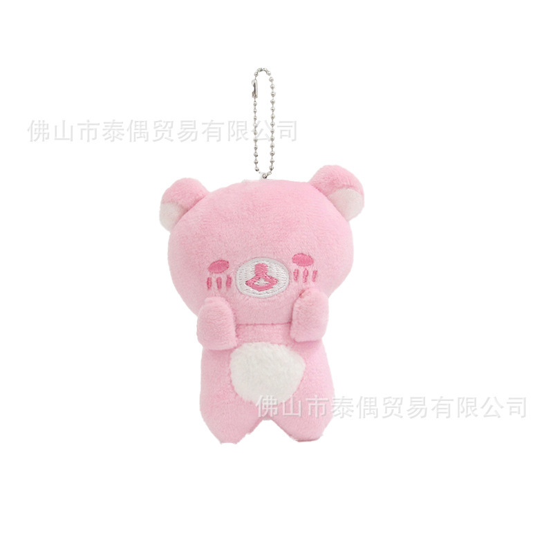 かわいい虹の熊の傘の手の玉の七色の人形のぬいぐるみの怠惰な熊は雨が降って晴れます。|undefined