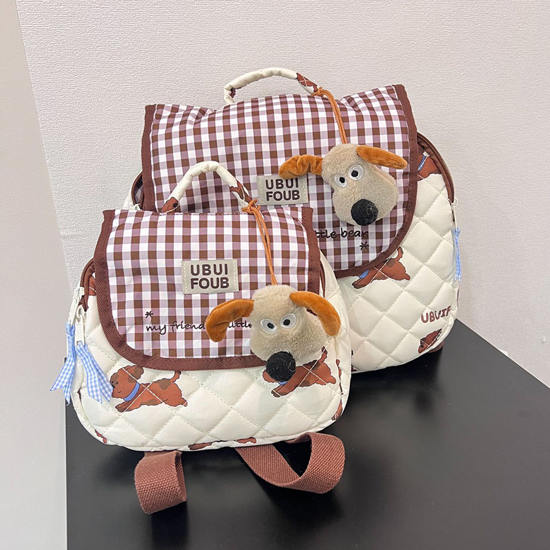Escuela de jardín de infantes Escuela de escuela primaria Mochila de dibujos animados lindo cachorro para padres e hijos 2025 Nuevo estilo con colgante Mochila para niños