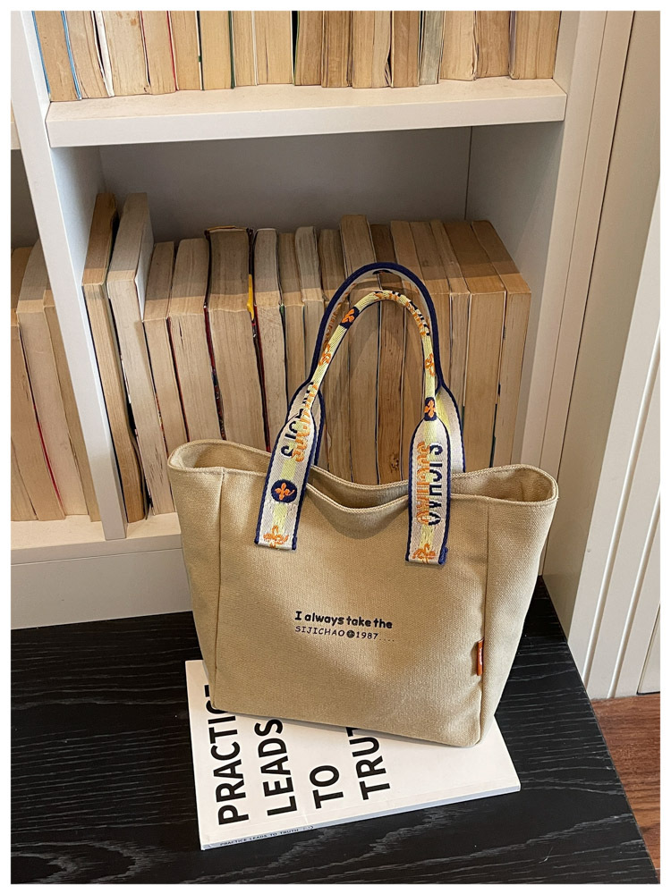 Bolso de lona de gran capacidad para mujeres 2026 verano nuevo bolso de mano ligero y simple para viajar bolso de ocio bolso de mamá