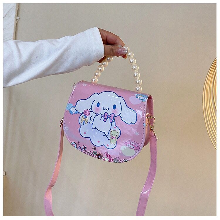 2024 nueva bolsa de hombro para niños princesa Elsa dibujos animados Yue Gui perro coreano nicho perla bolsa de mano inclinada